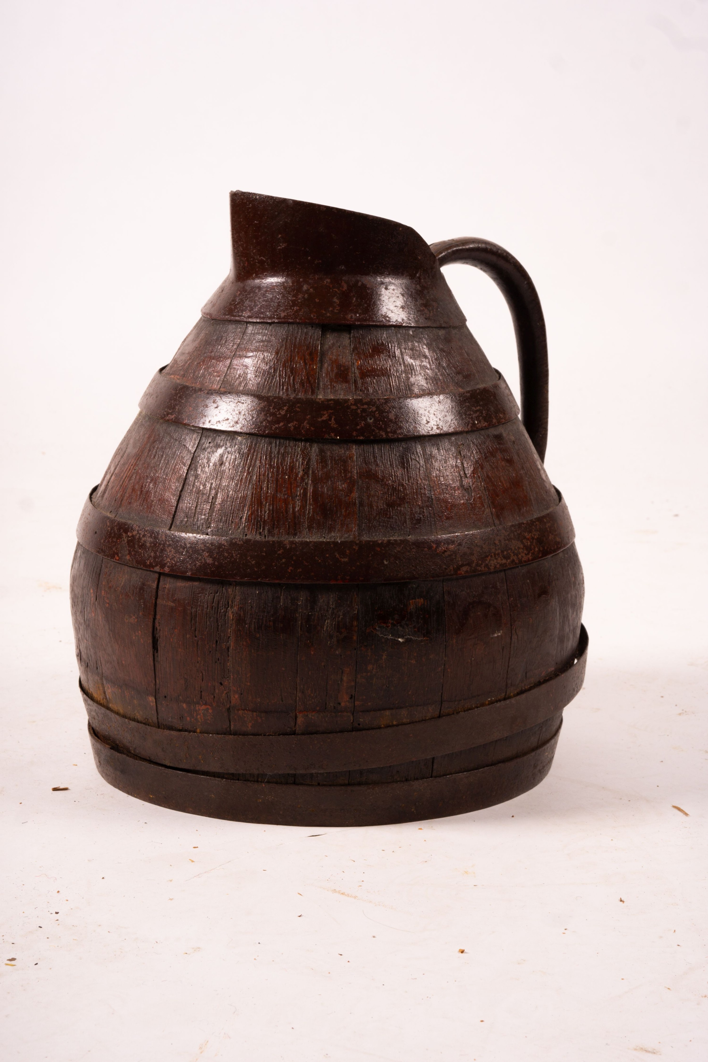 A Victorian iron bound staved oak jug, height 36cm, an amphora style pottery vase and a copper warming pan